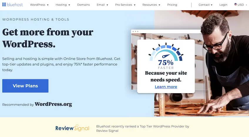 Screenshot of Bluehost's WordPress hosting landing page, with a man doing woodwork